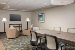 A television and/or entertainment centre at Candlewood Suites Alexandria West, an IHG Hotel