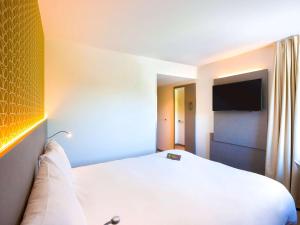 Voodi või voodid majutusasutuse ibis Styles Kortrijk Expo toas