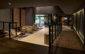 Гостиная зона в Hotel Cassino Tower Curitiba Aeroporto By Nacional Inn