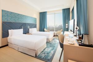 Barcelo Al Jaddaf, Dubai房間的床