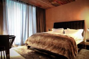 Cama ou camas em um quarto em Hotel Zhero – Ischgl/Kappl