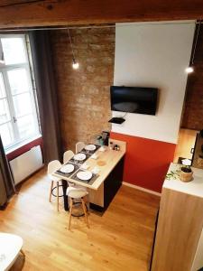 Cosy appartement, dans les pentes de la Croix Rousse TV 또는 엔터테인먼트 센터