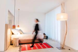 A bed or beds in a room at Montimerso Skyscape Countryhouse