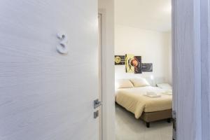 Кровать или кровати в номере Nùe Rooms