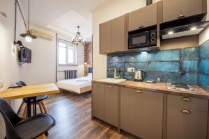 Una cocina o kitchenette en DayFlat Apartments Maidan Area