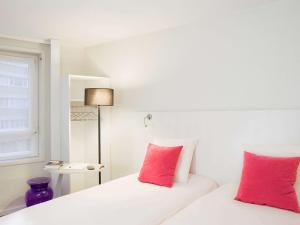 Krevet ili kreveti u jedinici u objektu ibis Styles Lille Centre Gare Beffroi