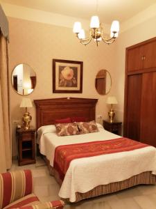 Cama ou camas em um quarto em Hotel Europa Boutique Sevilla