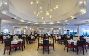 A restaurant or other place to eat at Djerba Aqua Resort