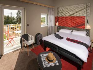 Tempat tidur dalam kamar di ibis Nantes Saint Herblain