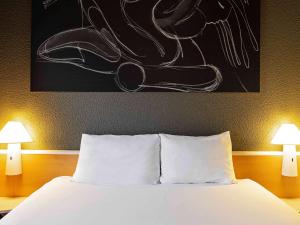 Ліжко або ліжка в номері Ibis Salamanca