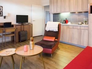 A cozinha ou kitchenette de Aparthotel Adagio Basel City