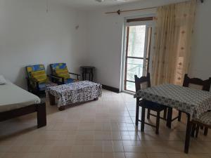 Una cama o camas en una habitación de Peponi Watamu