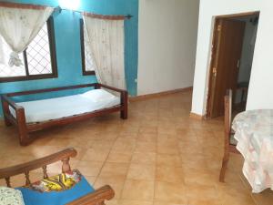 Una cama o camas en una habitación de Peponi Watamu