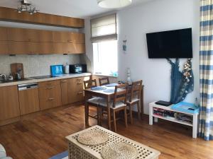 Кухня или кухненски бокс в Apartament Visby