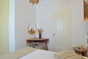 Voodi või voodid majutusasutuse Esperos Seaside Suite in Adamas, Milos toas