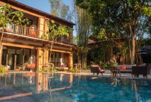 สระว่ายน้ำที่อยู่ใกล้ ๆ หรือใน Pai Village Boutique Resort