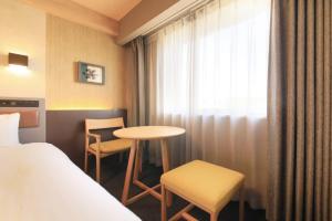 Ліжко або ліжка в номері Richmond Hotel Yamagata Ekimae