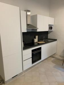 Η κουζίνα ή μικρή κουζίνα στο Luxury Valletta Apartment