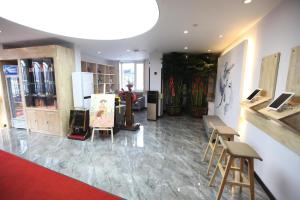 Fotografija v galeriji nastanitve 7Days Premium Harbin Xuefu Road Branch v mestu Harbin