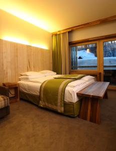 Llit o llits en una habitació de Termag Hotel Jahorina