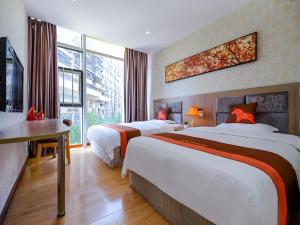 JUN Hotels Chongqing Nan'an Nanping Dongmo 객실 침대