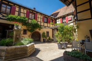 En have udenfor La Cour St-Fulrad - Les Suites