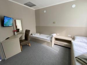 Кровать или кровати в номере Motel Carmen