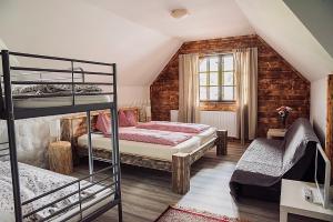 Gazdovský dvor B&B s Mini Wellness 객실 침대