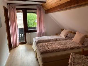 Зображення з фотогалереї помешкання Hiša Planšar Bohinj accommodations у місті Бохінь