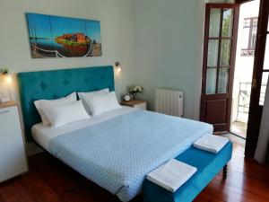 Cama ou camas em um quarto em Casa Azul Hostel