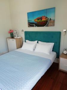 Cama ou camas em um quarto em Casa Azul Hostel