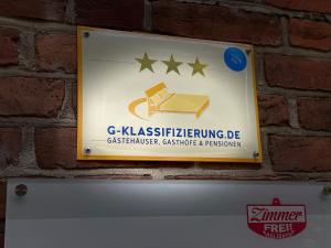 En logo, et sertifikat eller et firmaskilt på Boardinghouse Flensburg - by Zimmer FREI! Holidays