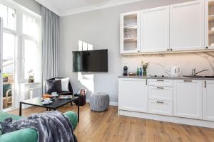 O bucătărie sau chicinetă la Apartamenty Vincent Sopot