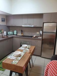 Kuhinja ili čajna kuhinja u objektu Jackies City Central Apartment