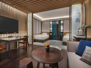 โทรทัศน์และ/หรือระบบความบันเทิงของ Park Hyatt Suzhou