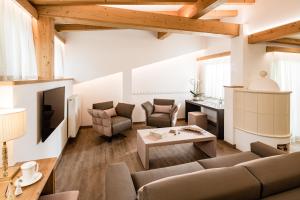 A seating area at Giardin Boutique Hotel B&B