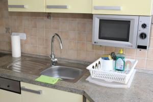 Dapur atau dapur kecil di Kaiser Apartments