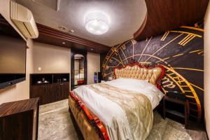 Кровать или кровати в номере Hotel Luna Ibaraki(Adult Only)