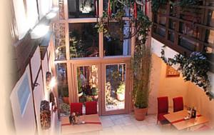 an overhead view of a restaurant with tables and chairs at Café Burgstraße in Wernigerode