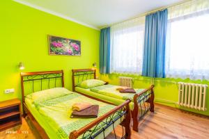 Ліжко або ліжка в номері Hotel Hvězda