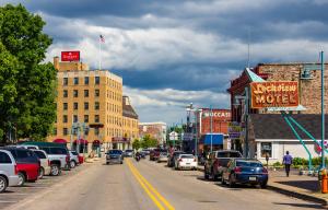 a city street with cars parked on the side of the road at adoba® Lockview in Sault Ste. Marie