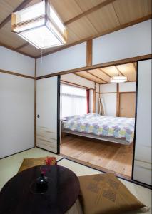 Llit o llits en una habitació de Kameoka - House - Vacation STAY 84269