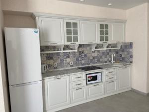 Una cocina o cocineta en Золотой Бугаз Грибовка