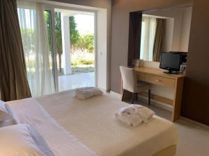 Una cama o camas en una habitación de Anavadia Hotel-All Inclusive