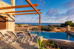 Maison avec Piscine - Vue sur Océan dans l'établissement Athinais villa, à Paleóchora