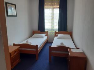 Postelja oz. postelje v sobi nastanitve Motel Jadranka