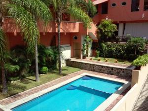 Swimming pool sa o malapit sa Hotel La Iguana