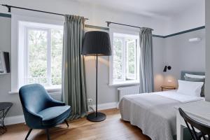 Vuode tai vuoteita majoituspaikassa Landhaus Flottbek Boutique Hotel