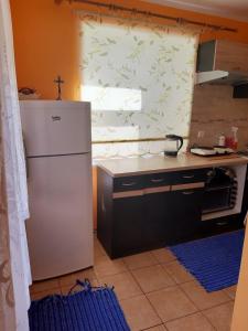 Una cocina o kitchenette en Dom i Pokoje Gościnne Zaruby Sejny