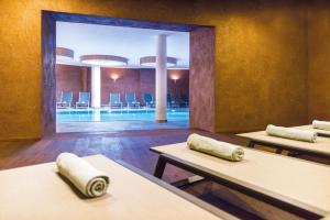 Kúpele alebo wellness v ubytovaní Hotel DAS ROYAL in Obereggen